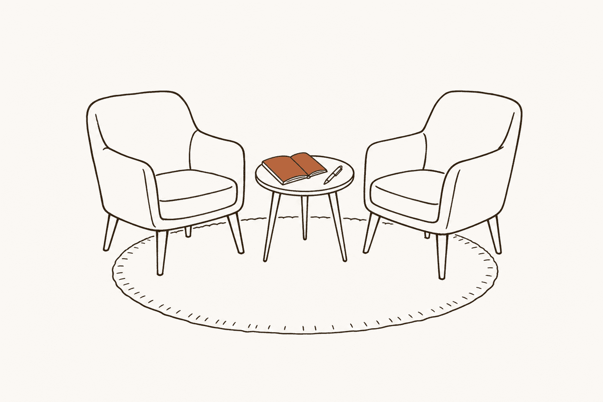 Two chairs facing each other in a therapy room